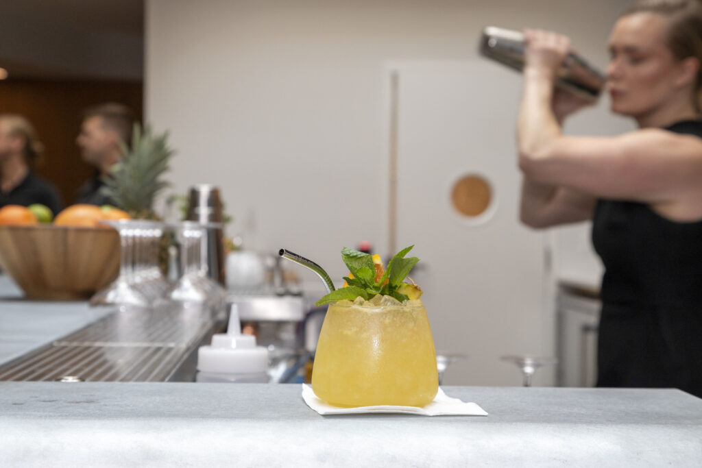 People collaborating for beverage case studies and menu development.