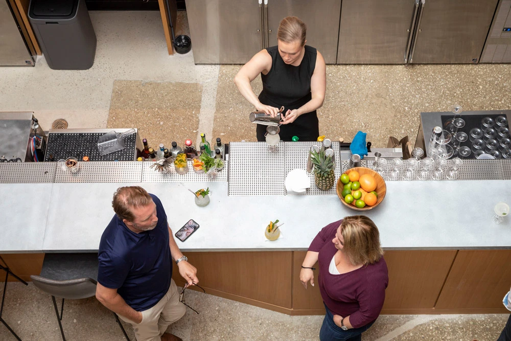 A satisfied customer during a beverage development consultation.